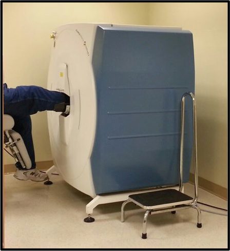 Figure 2: HRpQCT scanner located at the Osteoporosis Program, Toronto General Hospital. Shown here is how right tibia of the patient is being scanned.
