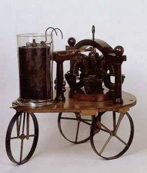 Figure 1: First Electric horseless Carriage, by Sibrandus Stratingh. It was simply a wooden platform carrying a battery and a motor. Now it is on display at the Museum Boerhaave in Netherlands.